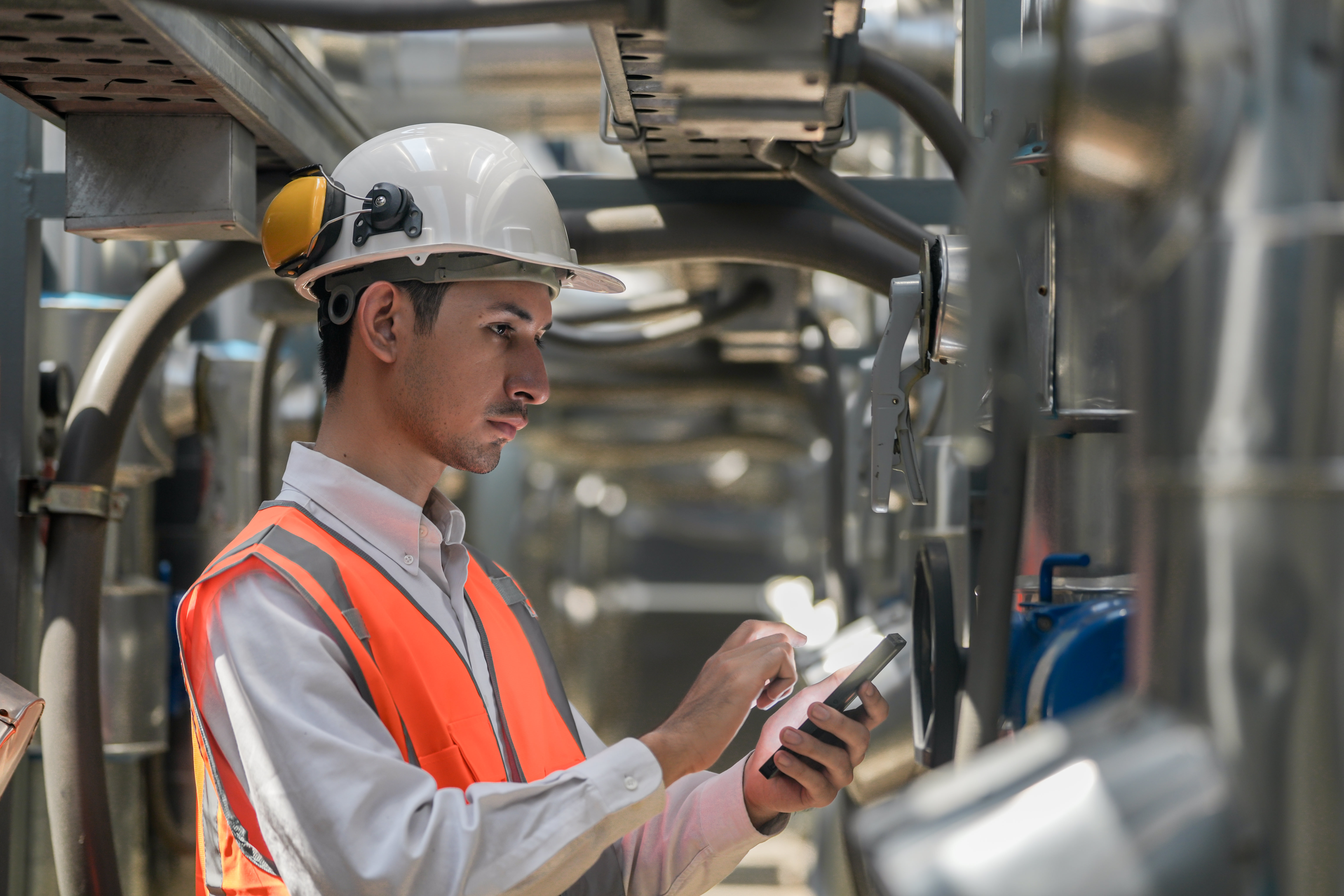 Technician working with connected equipment